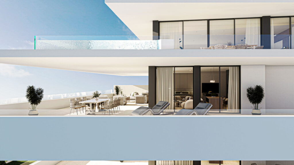 Carat Fase II – Fuengirola - luxury terrace with sun loungers, outdoor dining and open-plan interior with sea views