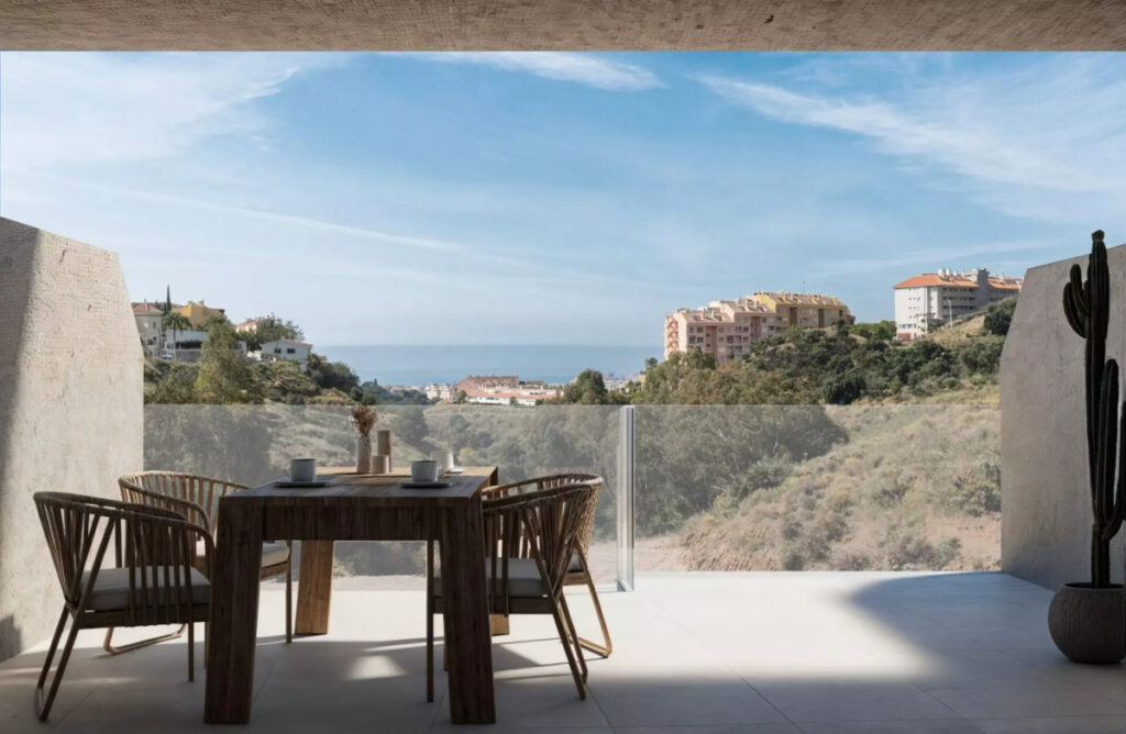 Medhills Fuengirola – Fuengirola - shaded terrace with rattan dining set and panoramic sea and hillside views