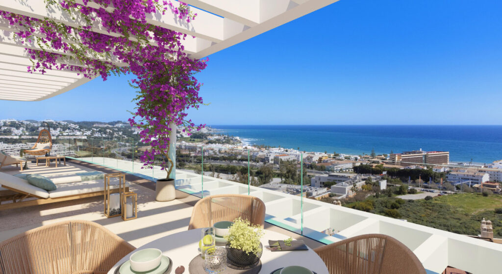 Royal Palms Mijas – FASE IV-4 – La Cala de Mijas - luxury terrace with panoramic sea views, bougainvillea pergola and outdoor dining area