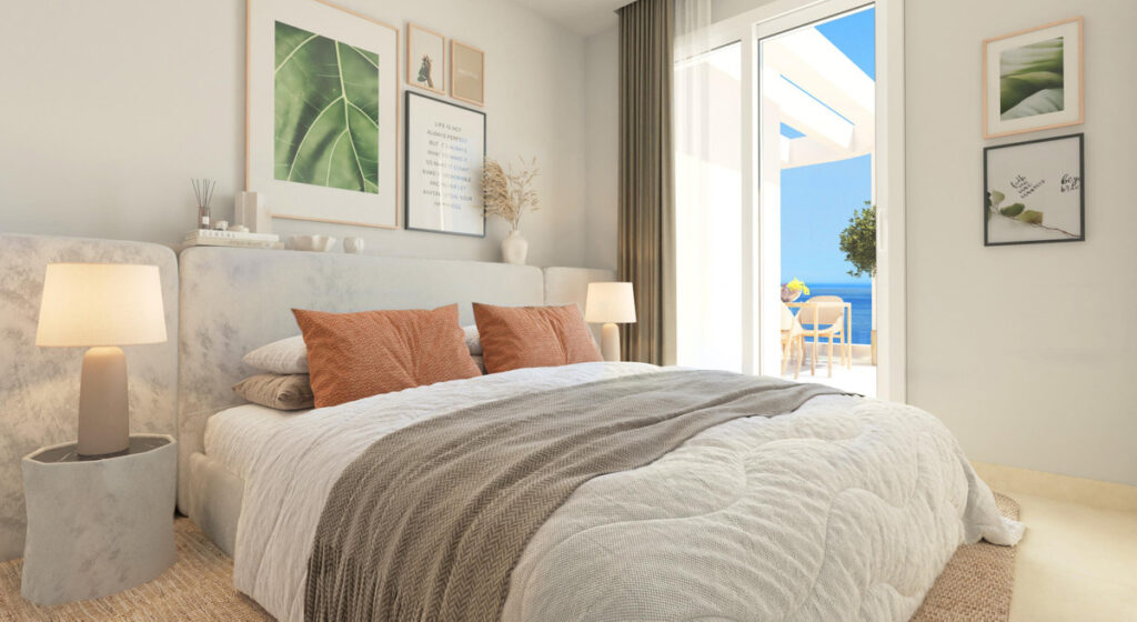 Royal Palms Mijas – FASE IV-4 – La Cala de Mijas - bright master bedroom with terrace access and sea views beyond sliding glass doors