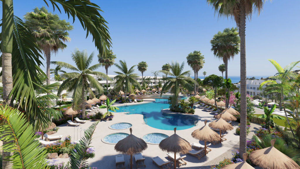 Serenity Frontline Golf Homes and Beach Club – PHASE III – La Alcaidesa - outdoor pool area with thatched parasols, sun loungers, jacuzzis and tropical palm gardens
