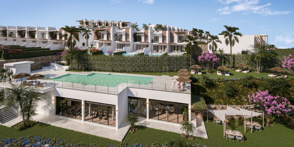Soleia Living FASE II – El Chaparral - luxury communal pool, rooftop terrace, lush gardens and white modern townhouses on hillside