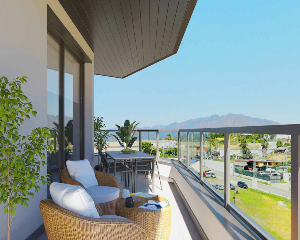 Suite Mijas III – Mijas - sunny furnished balcony terrace with wicker chairs, dining area, plants and mountain views