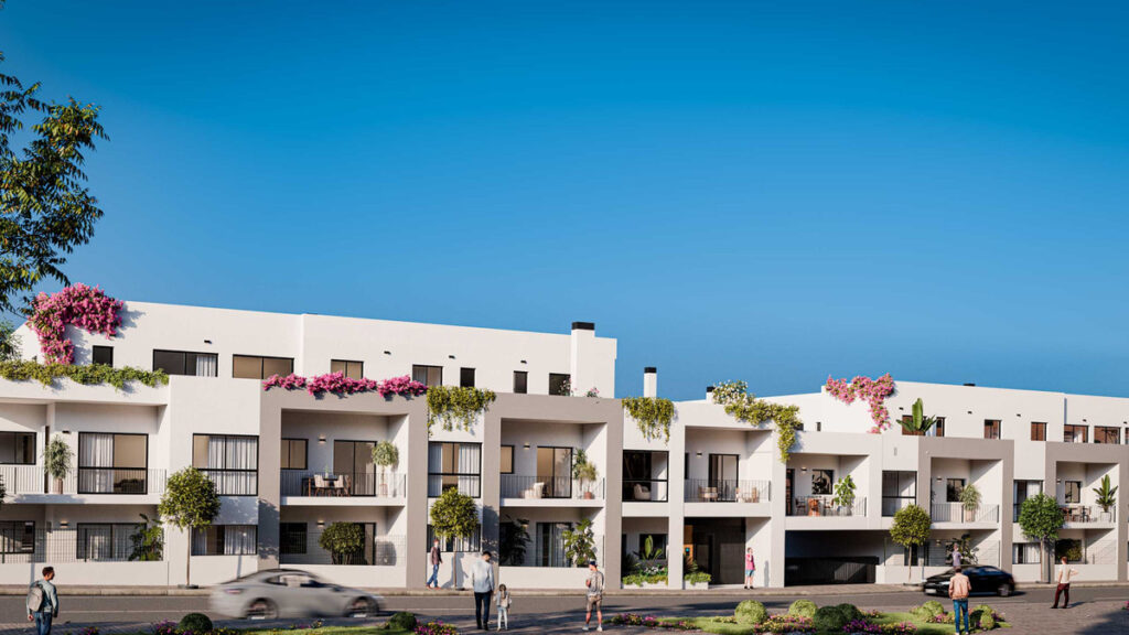 Olivara Living FASE I – Alhaurín de la Torre - white modern residential facade with balconies, lush greenery and bougainvillea blooms