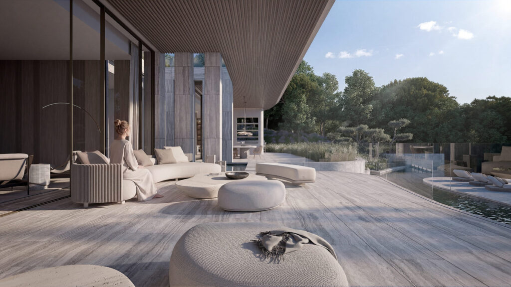 VILLA DUNE – The Fifteen – Sotogrande - beschattete Außenterrasse mit geschwungenen Sofas, Pool und üppigem Gartenblick