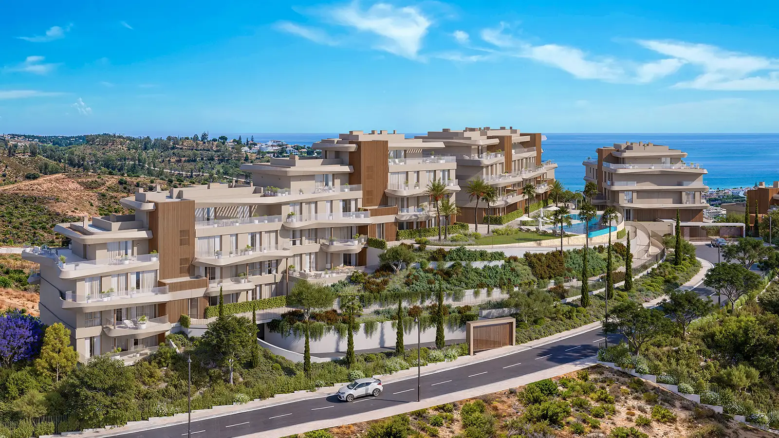 Vission Hills aerial view showing terraced apartment buildings, palm trees and sea views