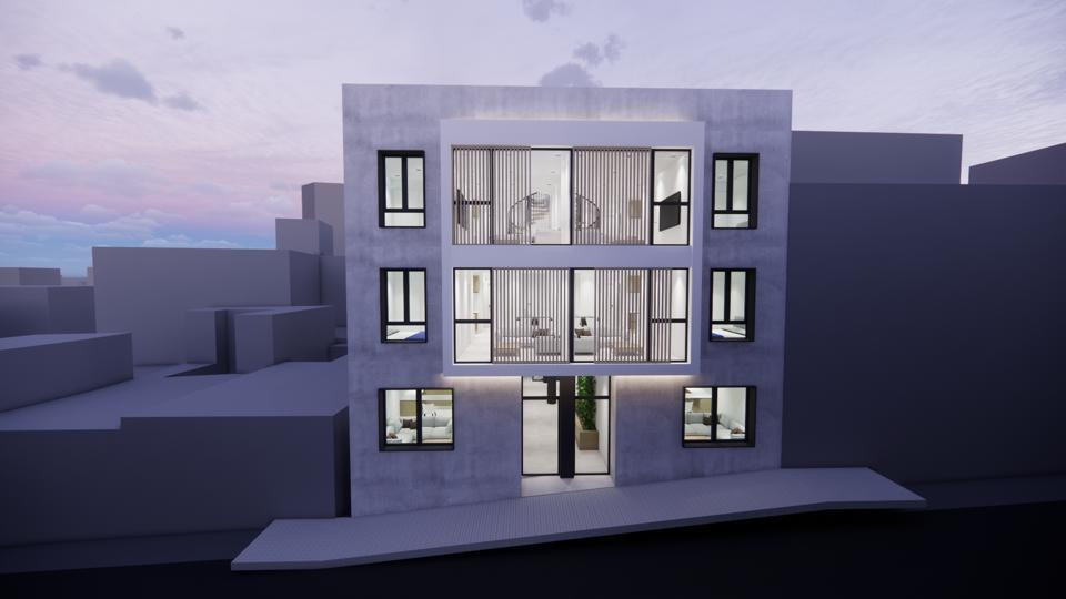 EON de Prosperidad – Málaga Centro - modern three-storey exterior facade illuminated at dusk with floor-to-ceiling glazing